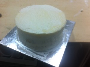 first coat 300x224 Light as Air Sponge Cake with Fresh Fruit and Whipped Cream