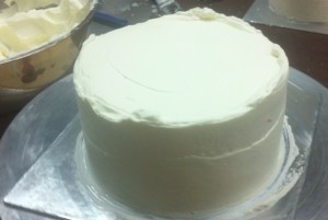 whipped cream second coat 300x201 Light as Air Sponge Cake with Fresh Fruit and Whipped Cream