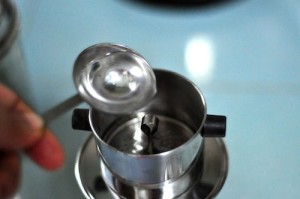 pour little water 300x199 Vietnamese Coffee Recipe   Iced Coffee (Cà phê sữa đá ) or Hot (Cà phê sữa nóng)