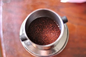 put coffee in 300x199 Vietnamese Coffee Recipe   Iced Coffee (Cà phê sữa đá ) or Hot (Cà phê sữa nóng)